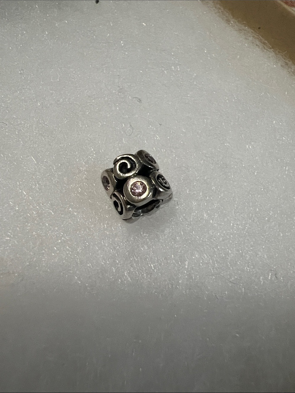Retired Pandora “Swirlies” Sterling Silver Scroll Charm with Light Pink Stones